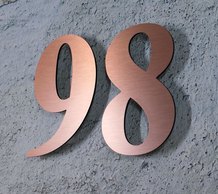 Brushed bronze float off the wall house numbers
